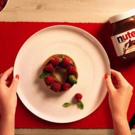 Bagel with NUTELLA®, raspberries and basil
