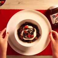 Chunky Granola with NUTELLA®, yoghurt and berries