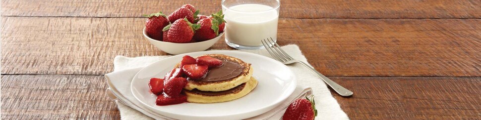 Ricotta Pancakes with NUTELLA hazelnut spread and Warm Strawberry Sauce
