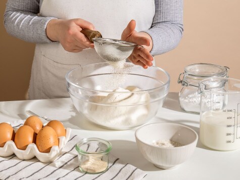 Poffertjes (Mini-Pfannkuchen) mit Puderzucker und nutella® - Schritt 1 Poffertjes (Mini-Pfannkuchen) mit Puderzucker und nutella® - Schritt 1