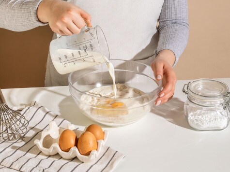 Poffertjes (Mini-Pfannkuchen) mit Puderzucker und nutella® - Schritt 2 Poffertjes (Mini-Pfannkuchen) mit Puderzucker und nutella® - Schritt 2