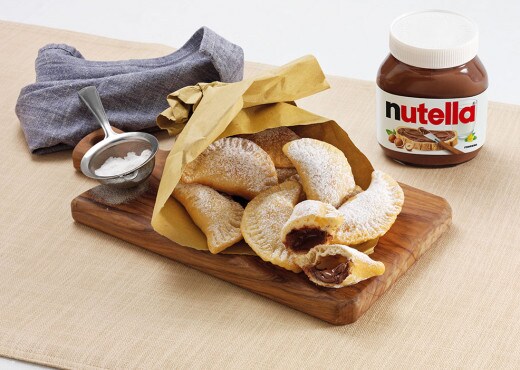 Empanadas doradas rellenas de Nutella® | Nutella
