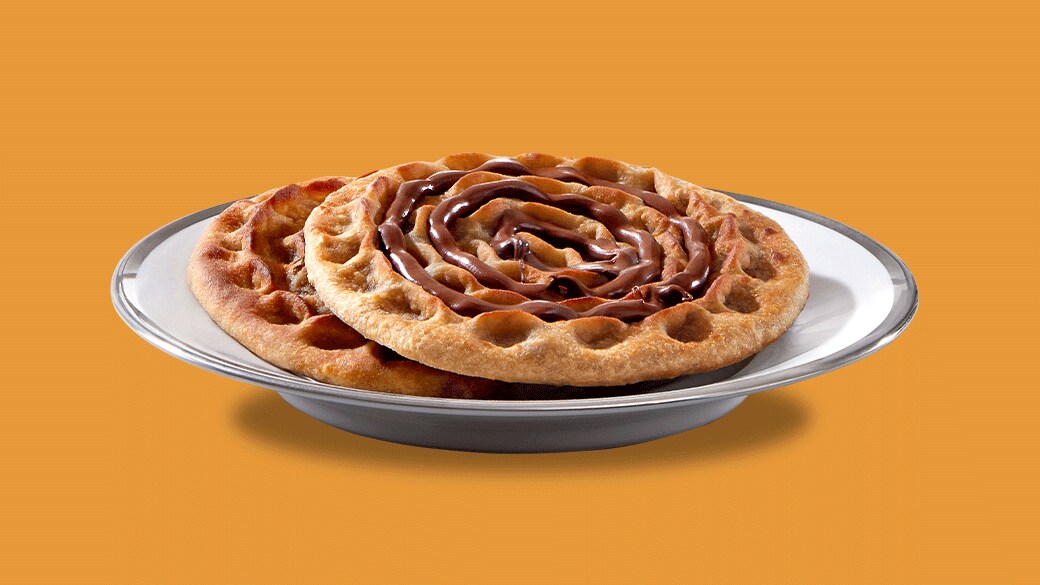 Rajasthani khooba roti layered with Nutella and sprinkled sesame seeds.