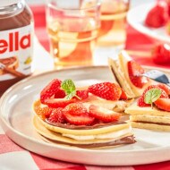 Pancakes with strawberries and mascarpone cheese