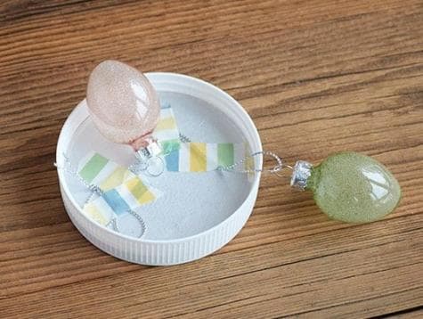 Nutella Easter jar craft step showing decorative assembly.