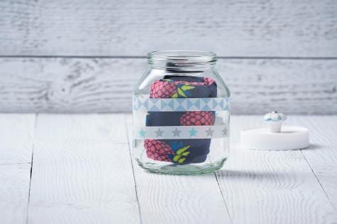 Nutella gift jar craft step showing decorative assembly.
