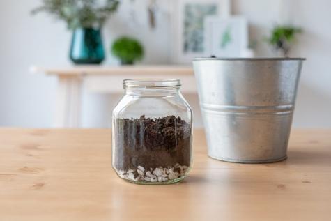 Nutella plant-jar craft step showing decorative assembly.