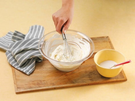 Christmas note cookies decorated with Nutella and festive icing.