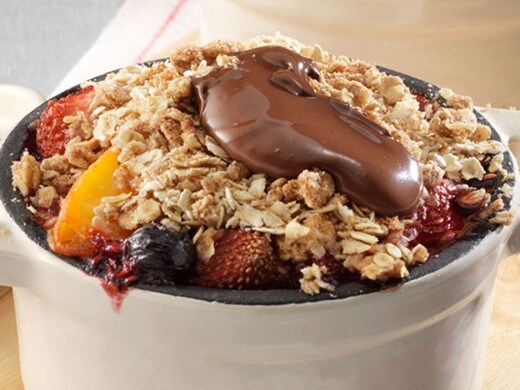 Breakfast fruit crumble topped with Nutella®