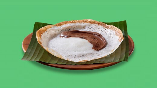 Kerala appam served with Nutella in a regional fusion breakfast recipe.