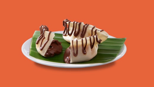 West Bengal-style momos filled with Nutella, presented with dipping sauce.