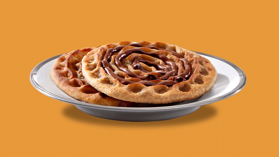 Rajasthani khooba roti layered with Nutella and sprinkled sesame seeds.