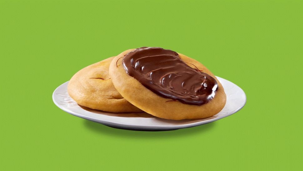 Uttar Pradesh sheermal flatbread brushed with Nutella and pistachio garnish.