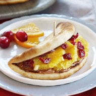 Naan tacos folded with Nutella, banana slices, and crushed nuts.