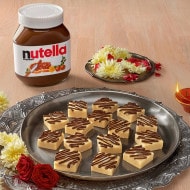 Traditional barfi sweets paired with Nutella for Diwali celebrations.