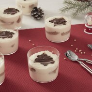 Mini tiramisu cups layered with cream and Nutella in a dessert shot.