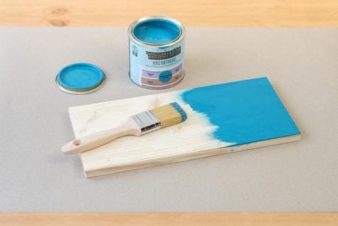 Nutella jar wall garden craft in step one of creation.