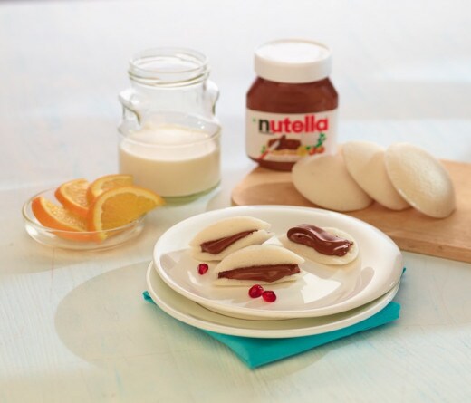 South Indian idli served with Nutella in a fusion breakfast style.