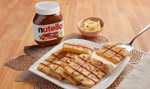 Banana mutabak filled with Nutella and folded into golden layers.