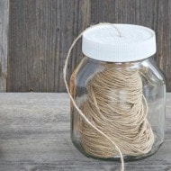 Dispensador de hilo con un tarro vacío de Nutella®