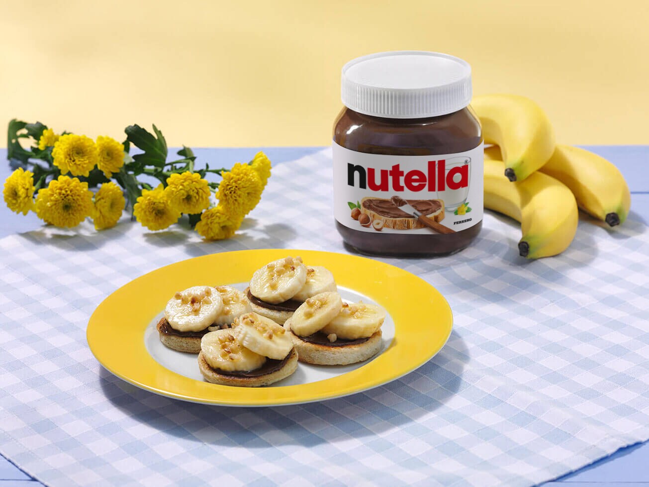 Step two: spreading Nutella on star-shaped English muffins, adding berries.