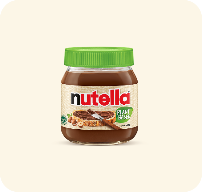 Plant-based Nutella alternative jar with green leaf graphic background.