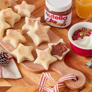 Step 2: adding Nutella dollop into cupcake centers before baking.
