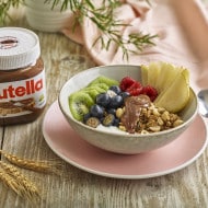 Step two: cutting Nutella brownie bites and arranging on serving board.