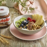 Step two: cutting Nutella brownie bites and arranging on serving board.