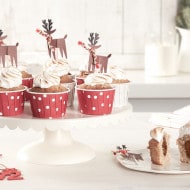 Step 4: piping Nutella cream onto cupcakes, finishing touches added.