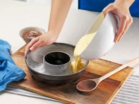 Recipe step two showing ciambella cake filling and shaping with Nutella.