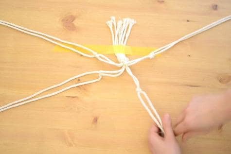 Third tutorial step showing hanging Nutella jar with ribbon decoration.