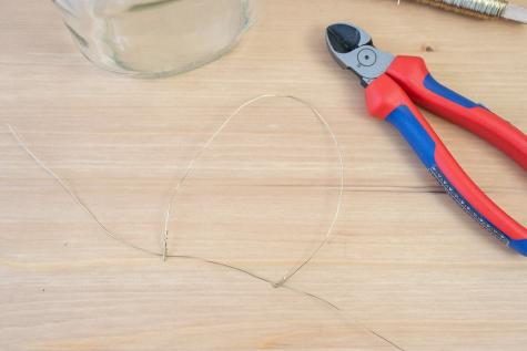 Step two: preparing jar mounts for Nutella wall garden assembly.