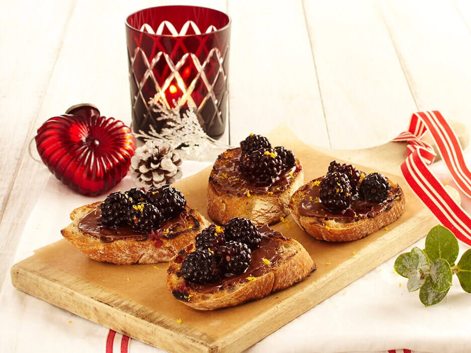 Bruschetta topped with Nutella, ricotta and mixed summer berries.