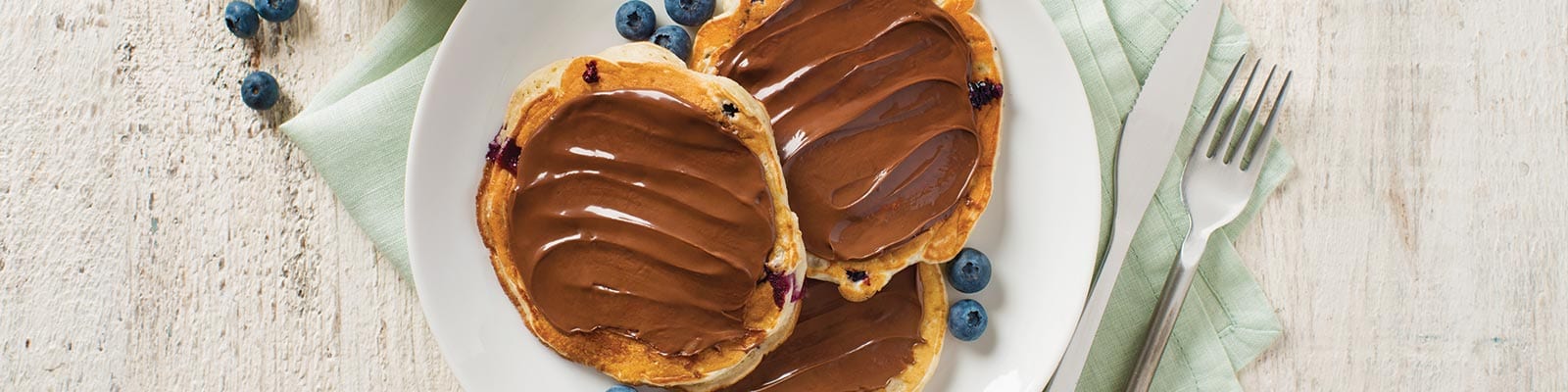 Yogurt and Berry Pancakes with NUTELLA<sup>®</sup> hazelnut spread