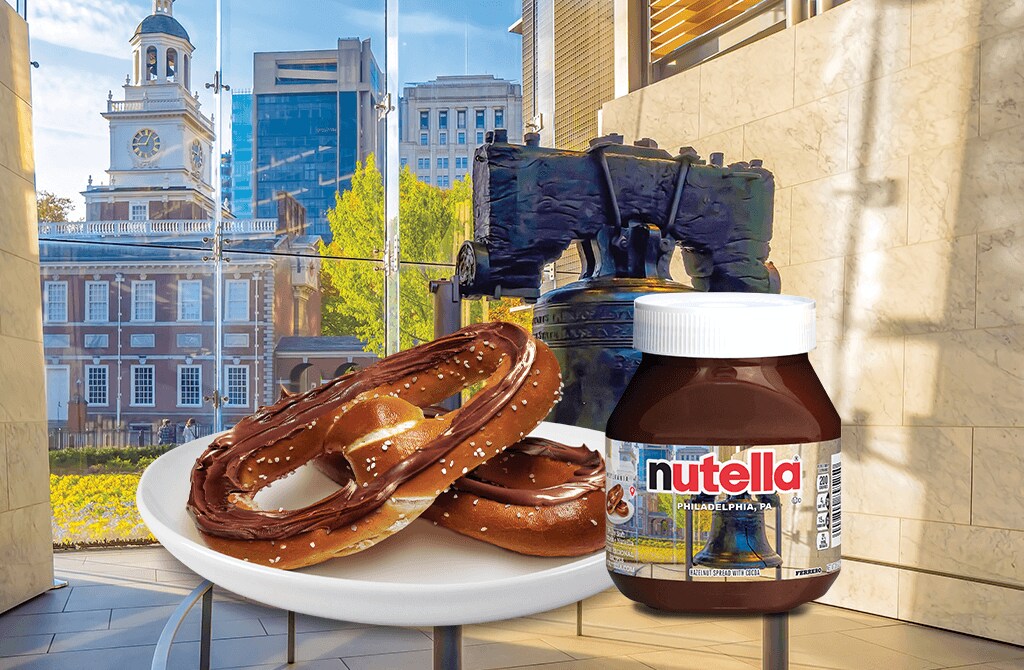 Promotional Nutella hero with jar, pancakes, toast and fruit