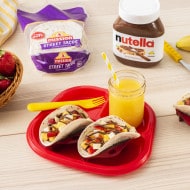 Make-ahead breakfast tacos filled with Nutella, banana and granola