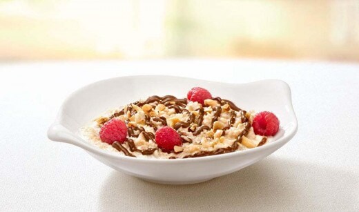 Oatmeal with NUTELLA® hazelnut spread and Fruit