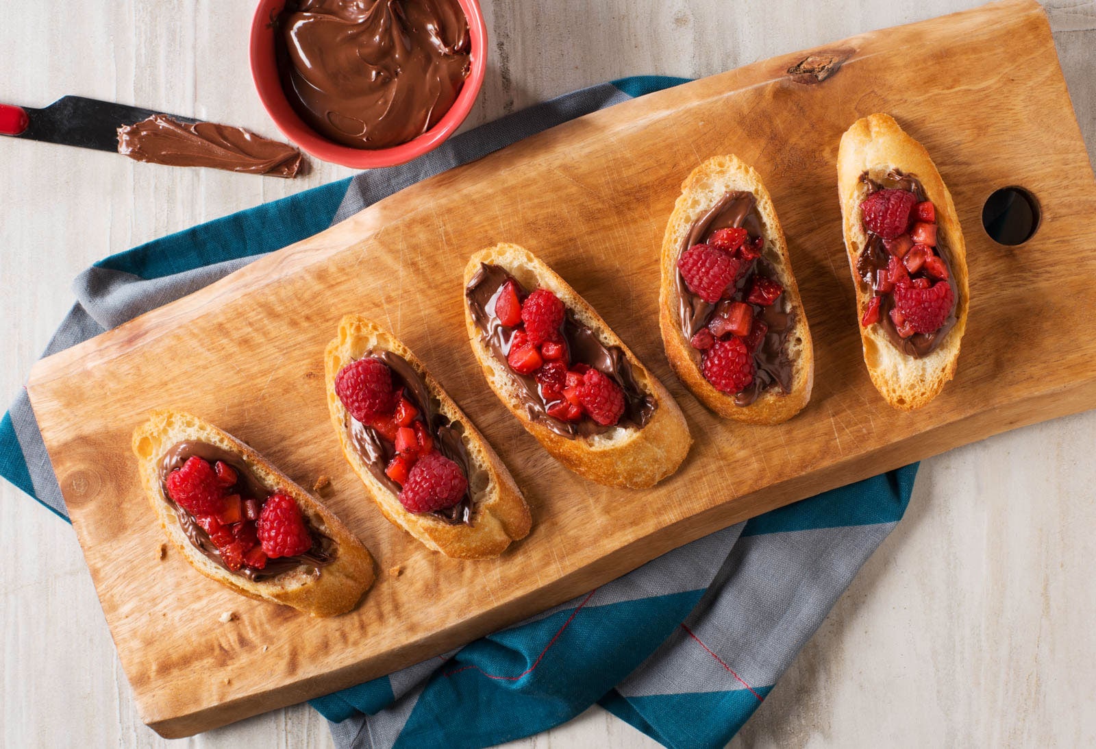 Bruschetta topped with NUTELLA hazelnut spread and Blackberries