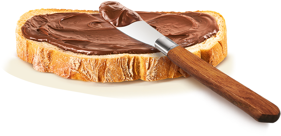 Bild von pflanzlicher Nutella, die auf einer Brotscheibe verteilt wird